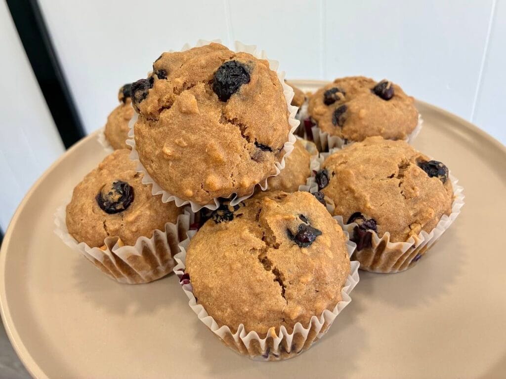 Healthy blueberry oat muffins served on a plate for breakfast