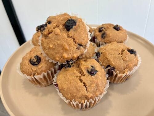 Healthy blueberry oat muffins served on a plate for breakfast