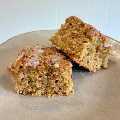 One-Bowl Cinnamon Swirl Snack Cake (Egg-Free Recipe) 6 A beautiful presentation of square slices of soft one-bowl cinnamon swirl snack cake on a plate, highlighting the brown sugar swirls.